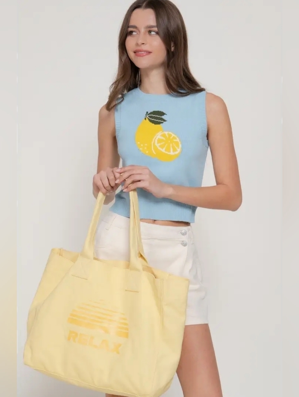 NWT, Active USA Light Blue Sleeveless Knit Top with Lemon Motif, Size Medium